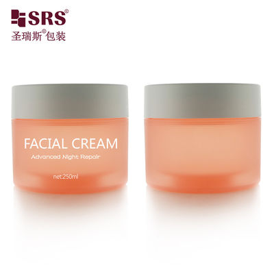 SRSJK-250g شكل أسطواني مستديرة الصف الغذائي الفارغ البرتقالي الشفاف البلاستيكي الزجاجة مع تصميم طبقة مزدوجة غطاء غطاء أبيض لأغطية العين
