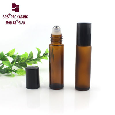 كرة فولاذية زجاجية أمبر على زجاجات العطور